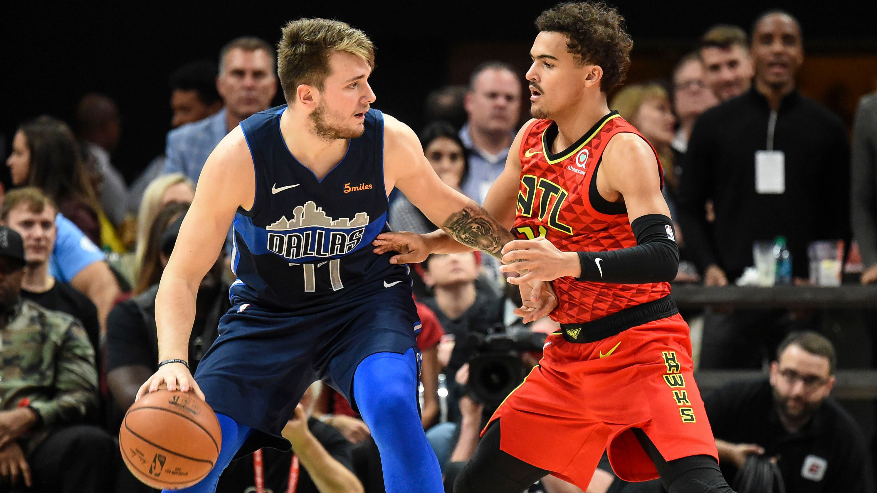 他把